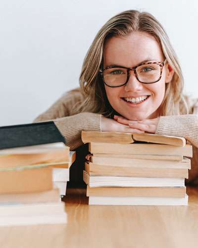 Happy Student Using Educational Resources