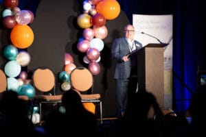 president chris coxon presenting at the rural empowerment conference